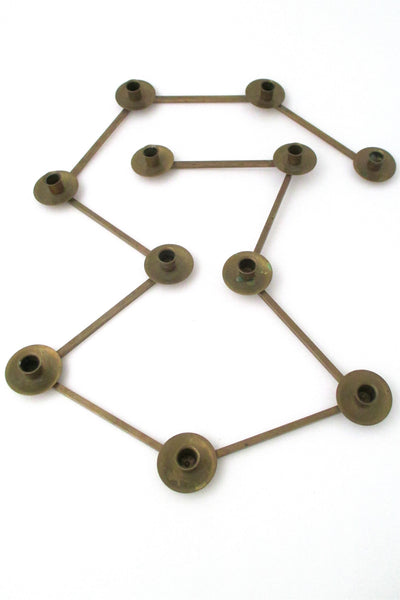 vintage made in Sweden modernist expanding candle holder in solid brass after the style of Carl Aubock