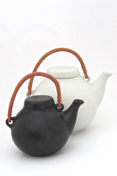 pair Arabia Finland vintage Scandinavian Modern ceramic GA teapots by Ulla Procope 1950s in matte white black