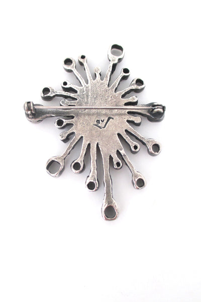 Guy Vidal pewter 'fireworks' brooch