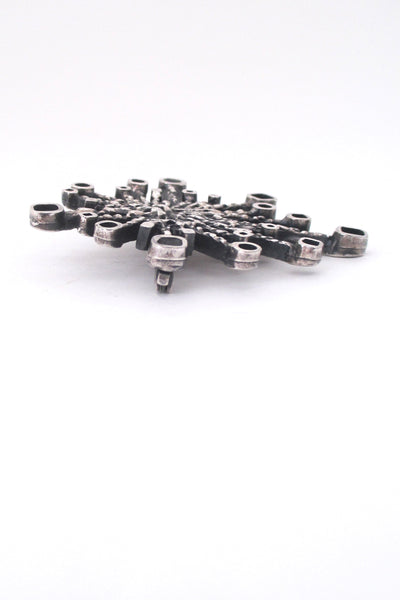 Guy Vidal pewter 'fireworks' brooch