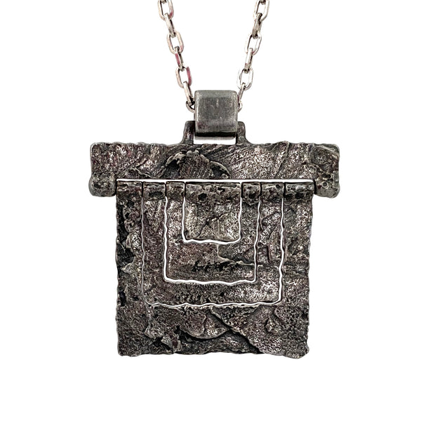 Guy Vidal textured pewter kinetic pendant necklace