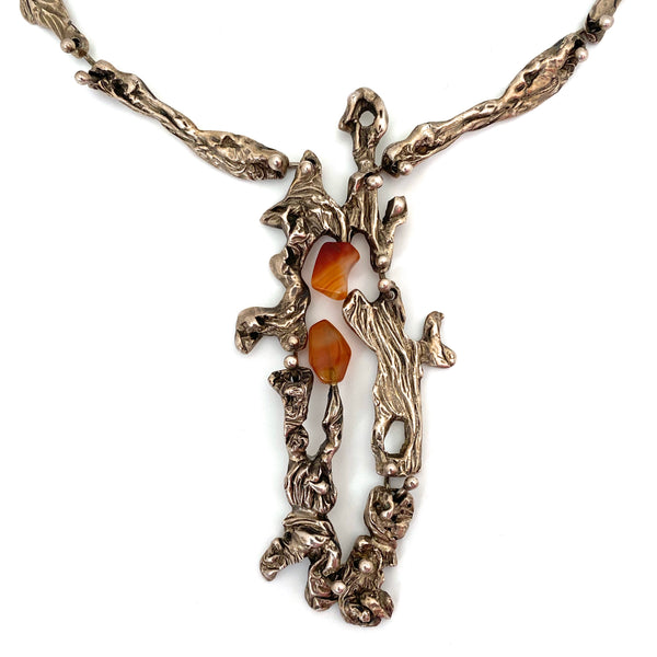 large brutalist silver articulated pendant necklace with banded agates