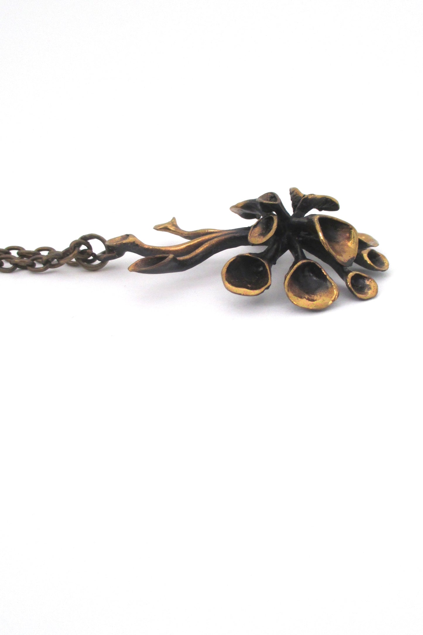 profile Hannu Ikonen Finland vintage bronze reindeer moss pendant necklace