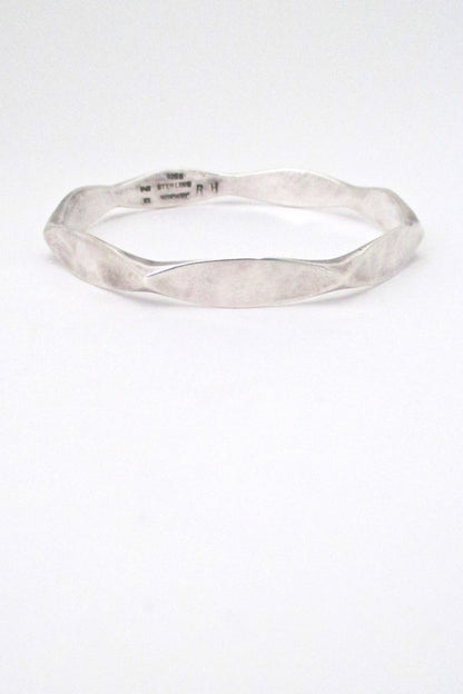 Plus Studios Norway vintage Scandinavian Modern hammered silver nut bangle bracelet by Ragnar Hansen