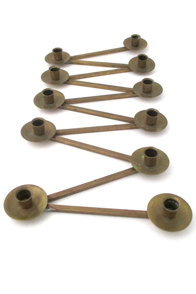 vintage made in Sweden modernist expanding candle holder in solid brass after the style of Carl Aubock