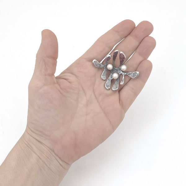 Walter Schluep hammered silver and pearl brooch