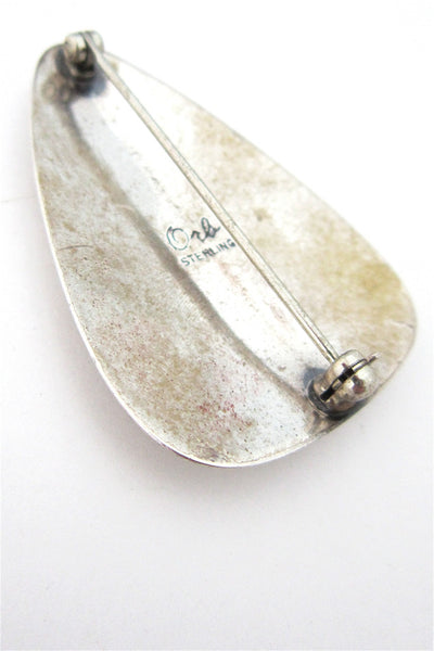 ORB layered brooch