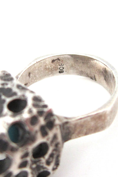 caged sphere ring