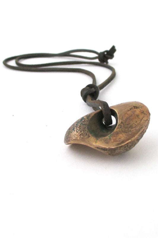 vintage bronze brutalist pendant necklace on leather 1970s